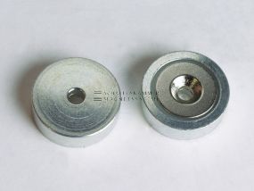 Magnetic system with through-hole, 90° countersink, turned metal housing and neodymium magnetic core