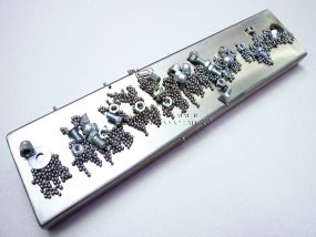Plate magnet with neodymium core