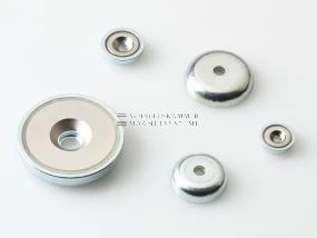 Magnet system with through-hole, 90° countersink, stamped metal housing and neodymium magnetic core