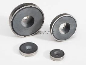 Magnetic system with through-hole, 90° countersink, stainless steel housing and magnetic core made of ferrite