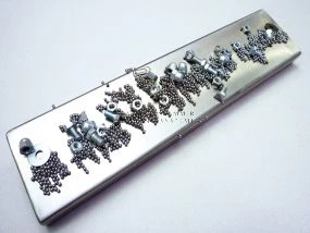 Plate magnet with ferrite core
